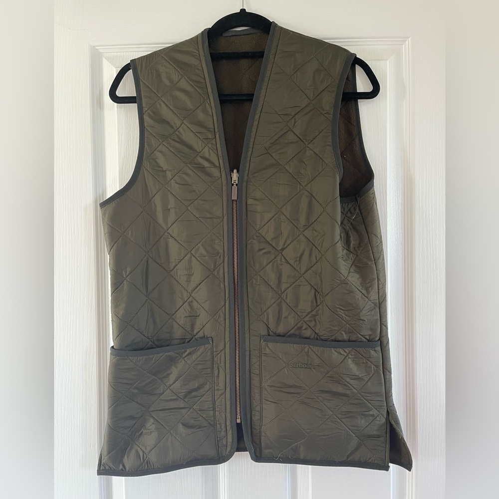 Olive green Barbour fleece lined vest. Size medium. Lightly damaged